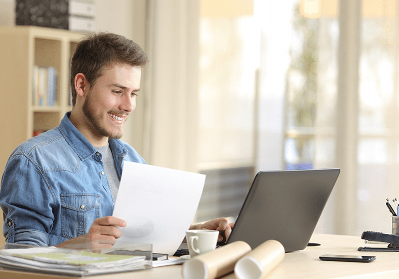 man working at laptop